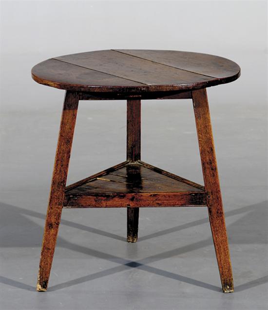 Appraisal: English oak cricket table th century circular top on tripod