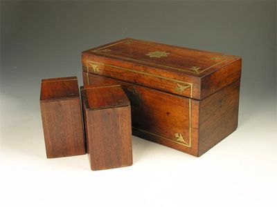 Appraisal: An early Victorian rosewood and bras marquetry tea caddy the