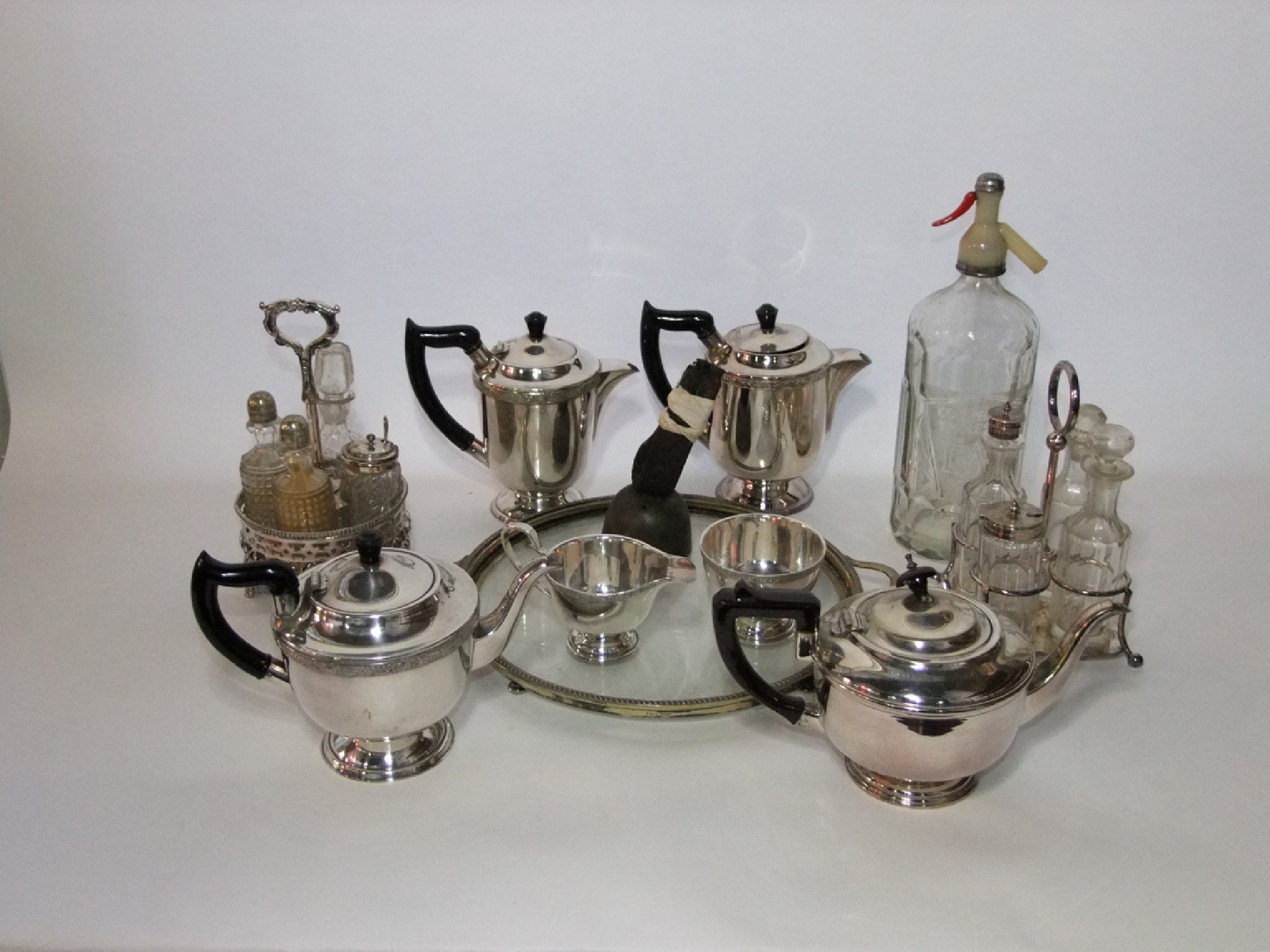 Appraisal: Assorted silver plated wares to include teapots a circular tray