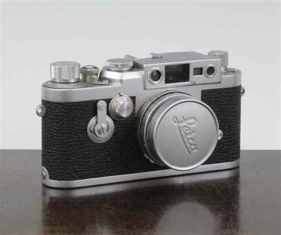 Appraisal: A Leica IIIG camera no with an Elmar lens no