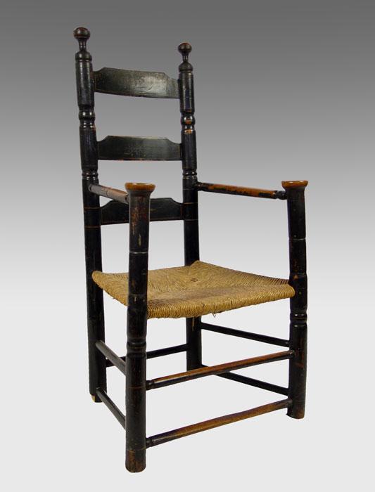 Appraisal: EARLY PILGRIM LADDER-BACK ARM CHAIR slat paint decorated back with