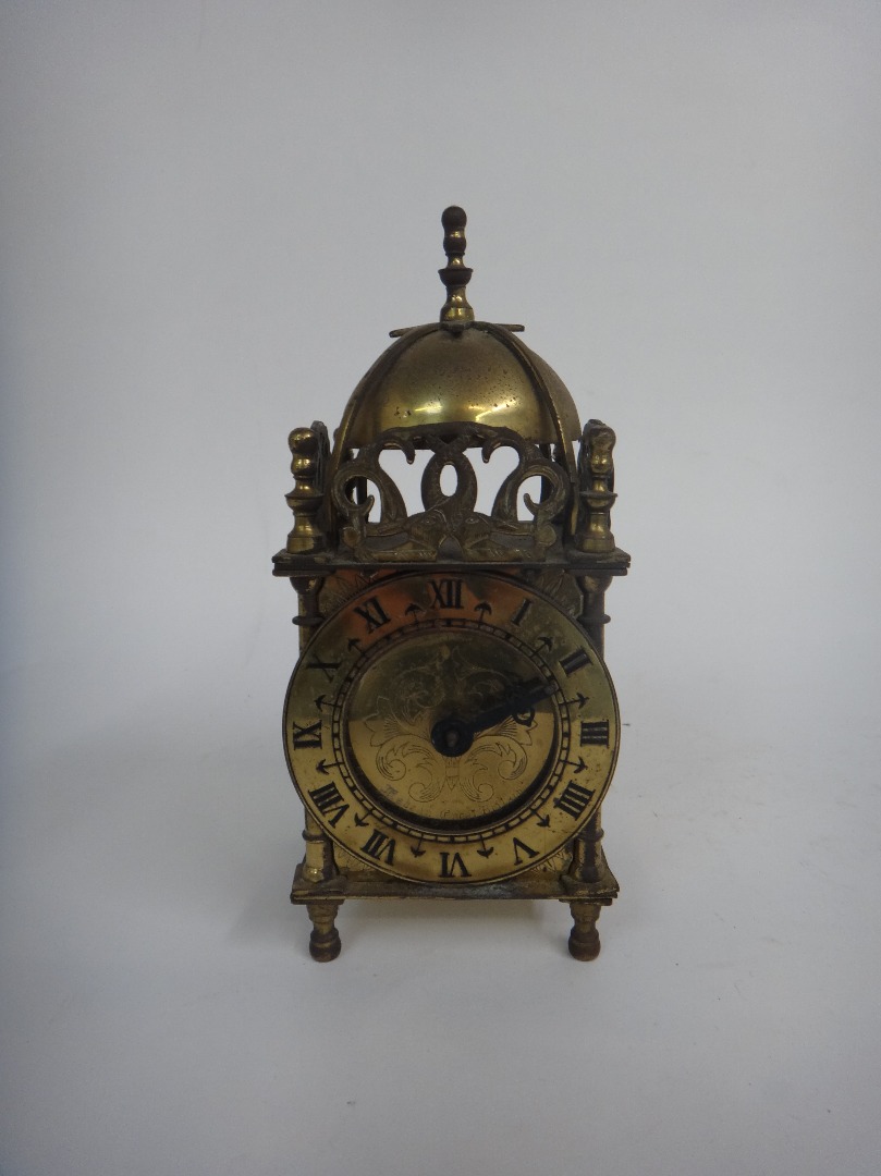 Appraisal: A Smiths brass cased reproduction electric lantern timepiece cm high