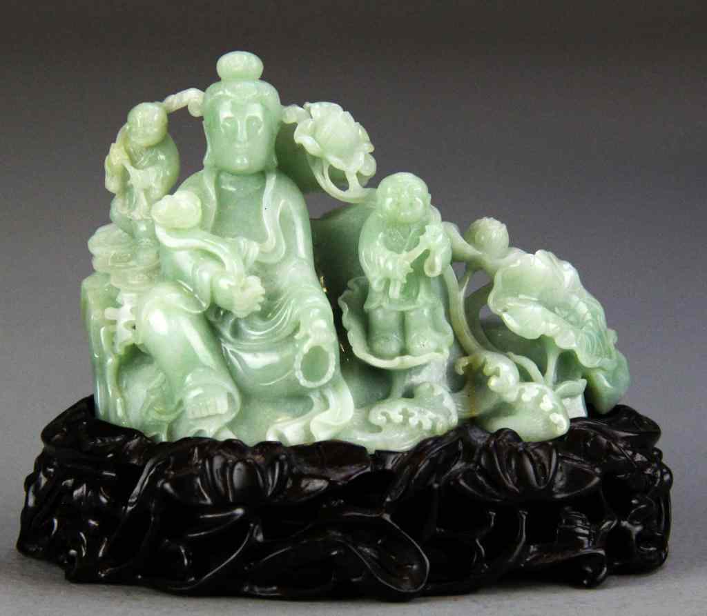 Appraisal: Chinese Qing Carved Jade Figural GroupFinely carved to depict a