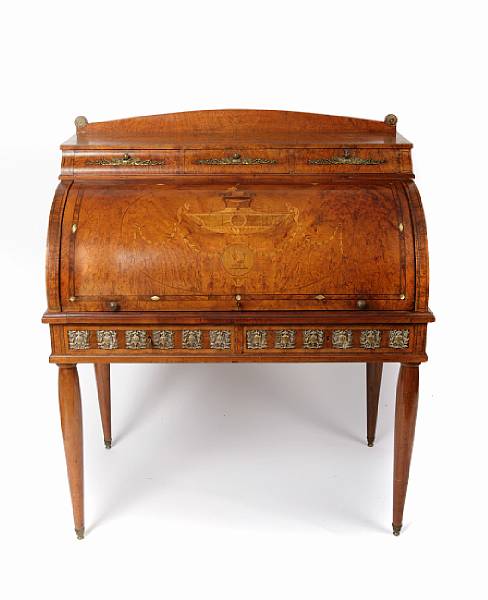 Appraisal: A Neoclassical style inlaid burlwood cylinder desk height in width