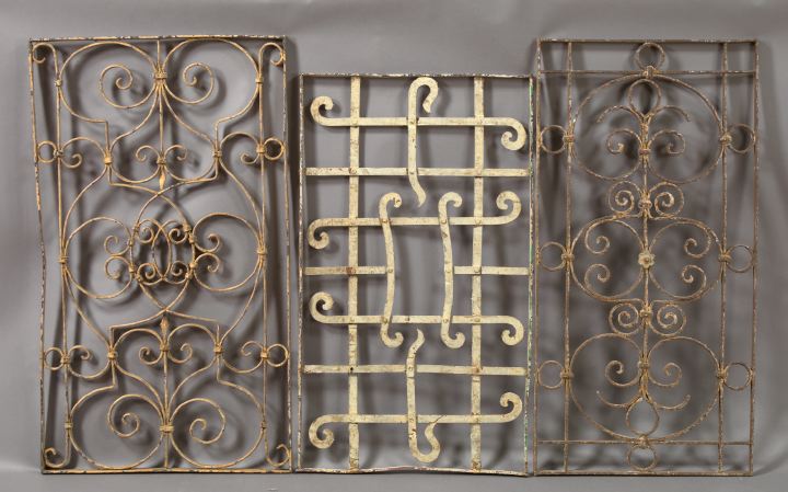 Appraisal: Three Small Wrought-Iron Door Grilles consisting of a good Belgian