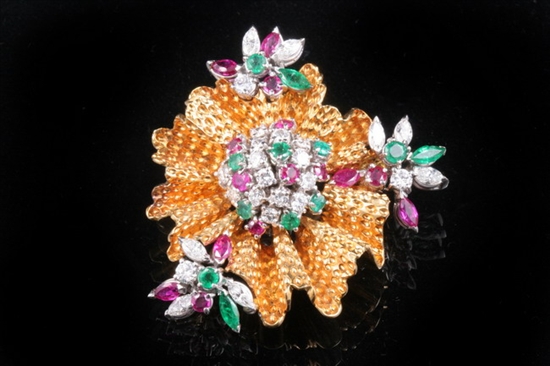 Appraisal: YELLOW AND WHITE GOLD EMERALD RUBY AND DIAMOND FLUTED RIBBON