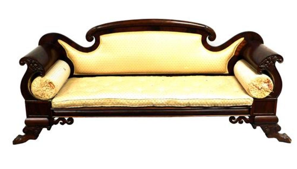 Appraisal: Empire sofa c mahogany serpentine crest with acanthus leaf carving