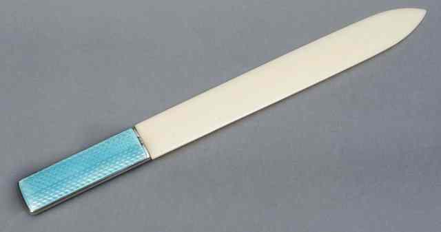 Appraisal: A SILVER AND ENAMELLED PAPER KNIFE with an ivory blade