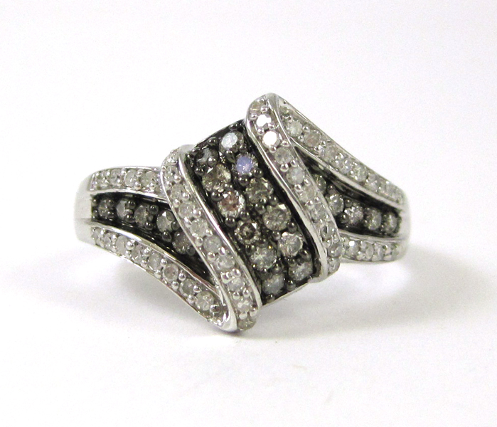 Appraisal: HELZBERG SILVER MIST DIAMOND RING set with round-cut diamonds together