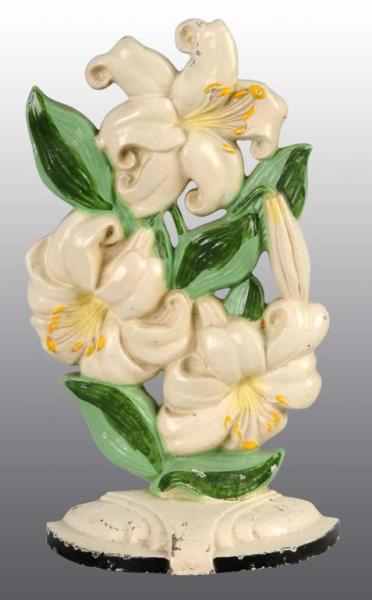 Appraisal: Cast Iron Tiger Lilies Doorstop Description Made by Hubley and