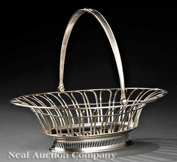 Appraisal: A George III Sheffield Wirework Cake Basket the reeded bead