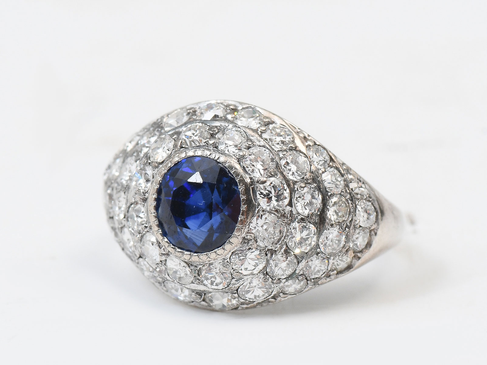 Appraisal: K EDWARDIAN CTW SAPPHIRE DIAMOND DOME RING Ca Edwardian style