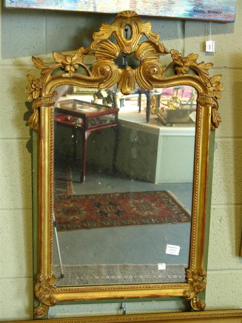 Appraisal: REGENCE STYLE GILTWOOD MIRROR Turn of the century the carved