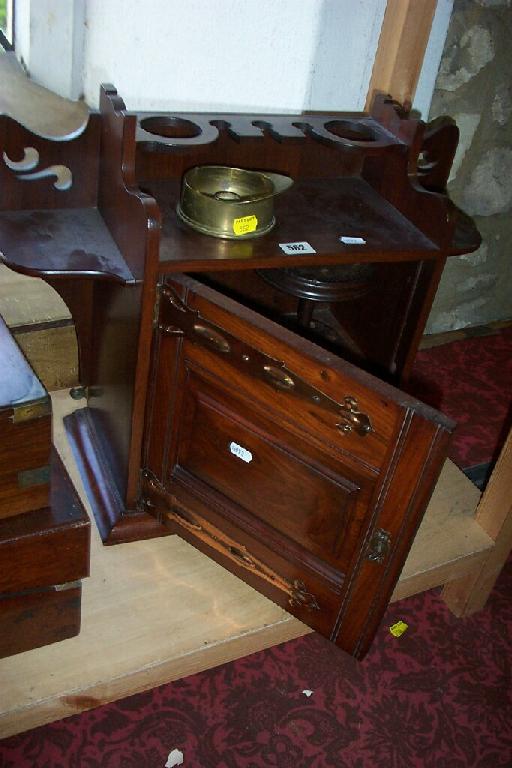 Appraisal: A late th century oak smokers cabinet with decorative copper