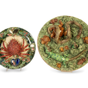 Appraisal: Two Portuguese Palissy Majolica Wall Plates th Century one depicting