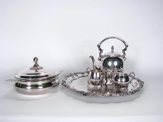 Appraisal: Group of Silver Plated Serving Items including three piece tea