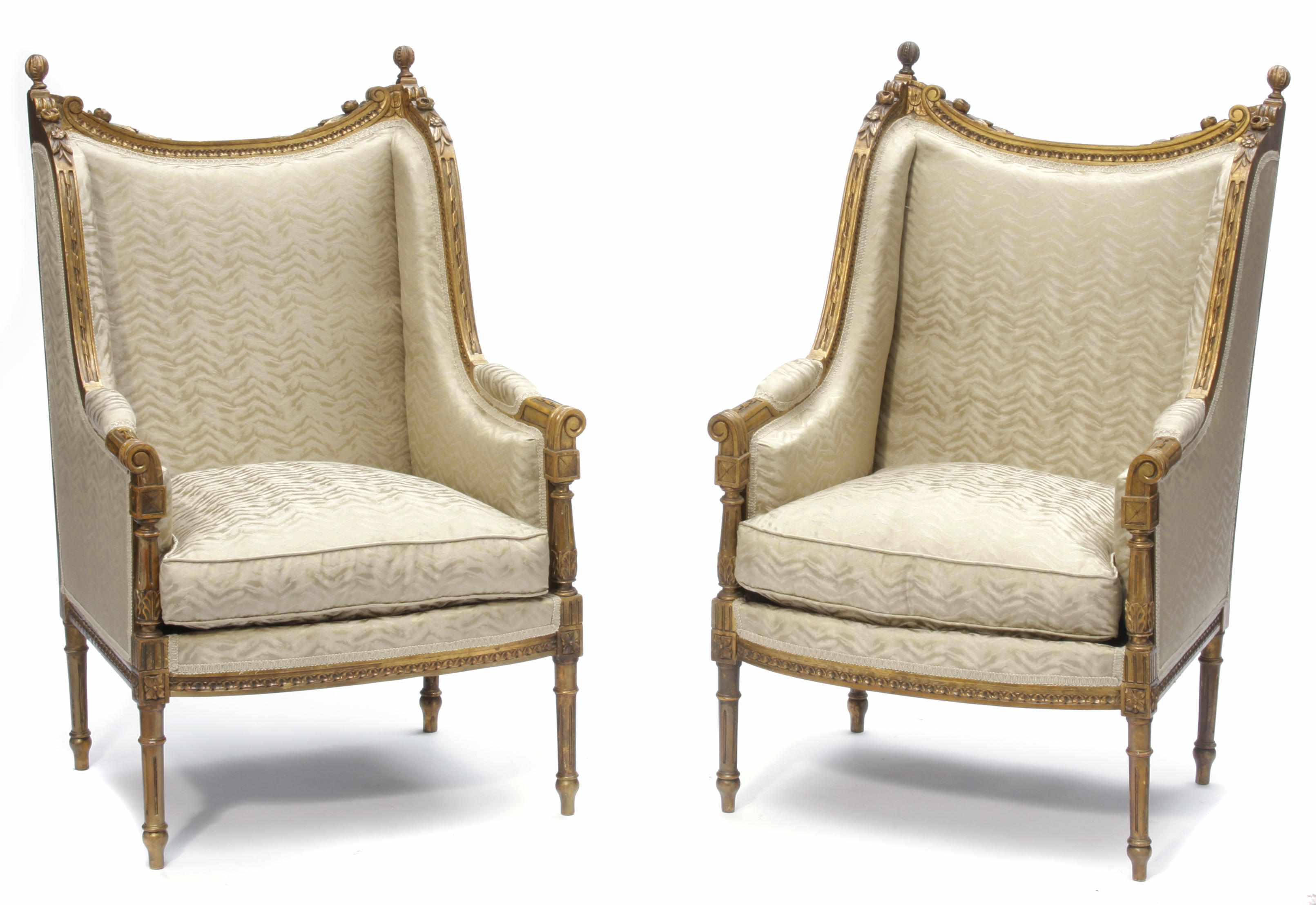 Appraisal: A pair of Louis XVI style wing chairs height in