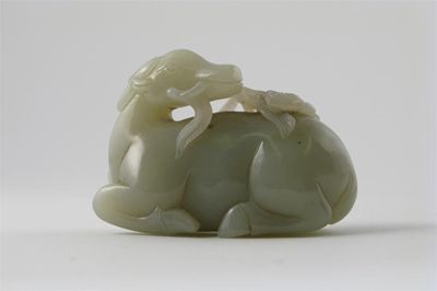 Appraisal: A Chinese pale celadon jade carving of a recumbent goat