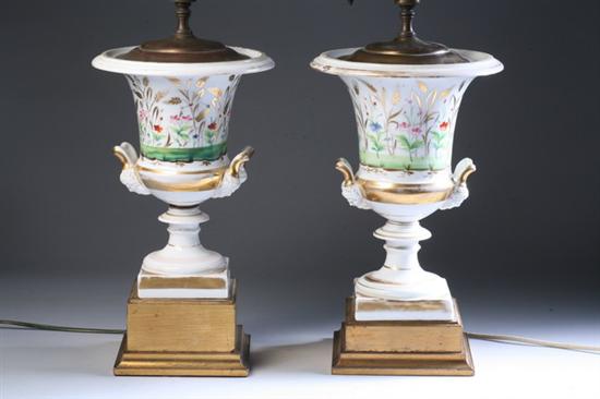 Appraisal: PAIR PARIS PORCELAIN URNS th century Hand-painted with continuous polychrome