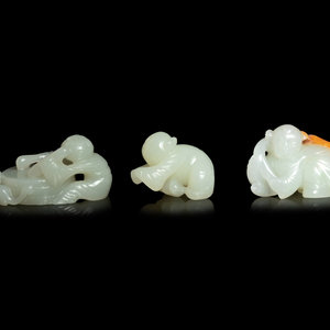 Appraisal: Three Chinese Jade Figures of Boys the first beating a