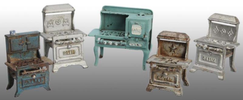 Appraisal: Lot of Cast Iron Toy Children's Stoves Description Includes Daisy