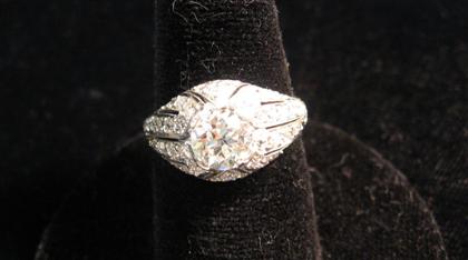 Appraisal: Platinum and diamond ring th century Center round diamond about