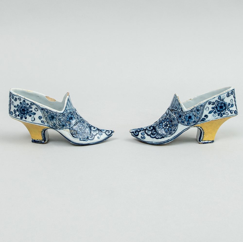 Appraisal: Pair of Dutch Delft Blue and White Models of Lady's