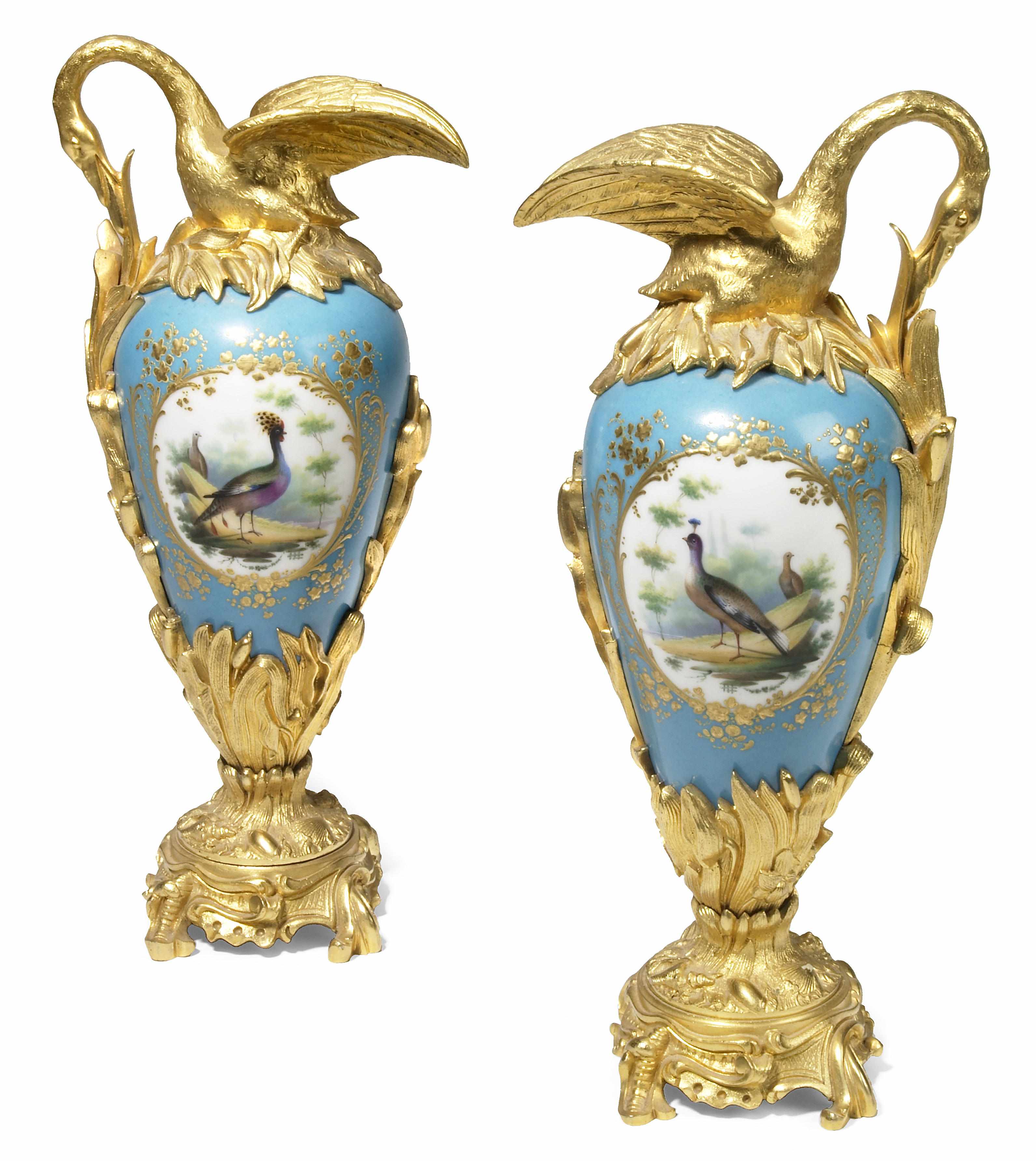 Appraisal: A pair of Svres style gilt bronze mounted porcelain urns