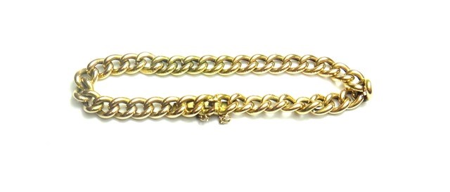 Appraisal: A gold curb link bracelet on a snap clasp detailed