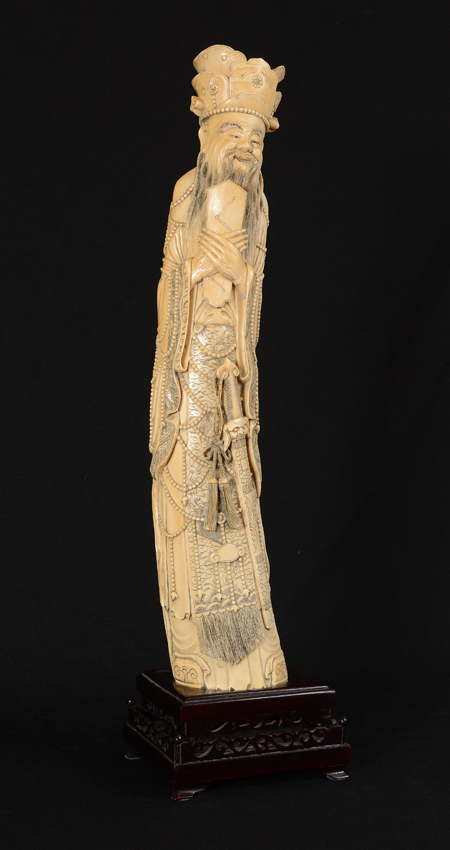 Appraisal: EXTRAORDINARILY LARGE CARVED IVORY EMPEROR Figure of a royal man