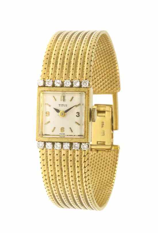 Appraisal: An Karat Yellow Gold and Diamond Wristwatch Titus x mm