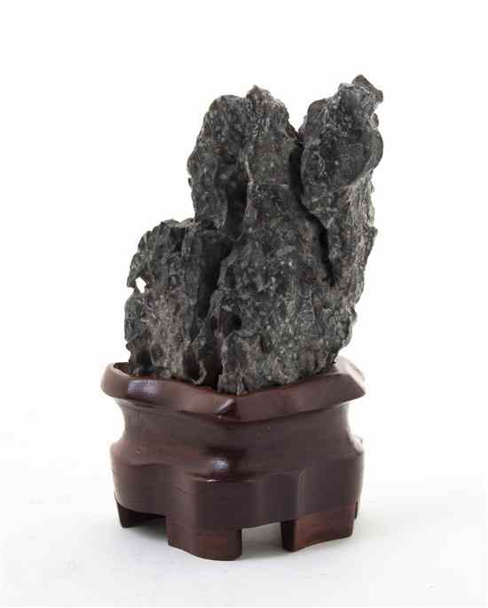 Appraisal: A Scholar's Rock the stone of a metallic black with