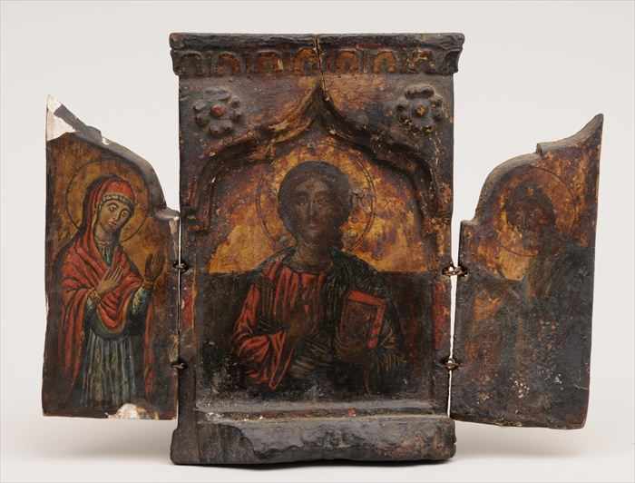 Appraisal: RUSSIAN PAINTED WOOD TRYPTYCH The central panel with Christ holding