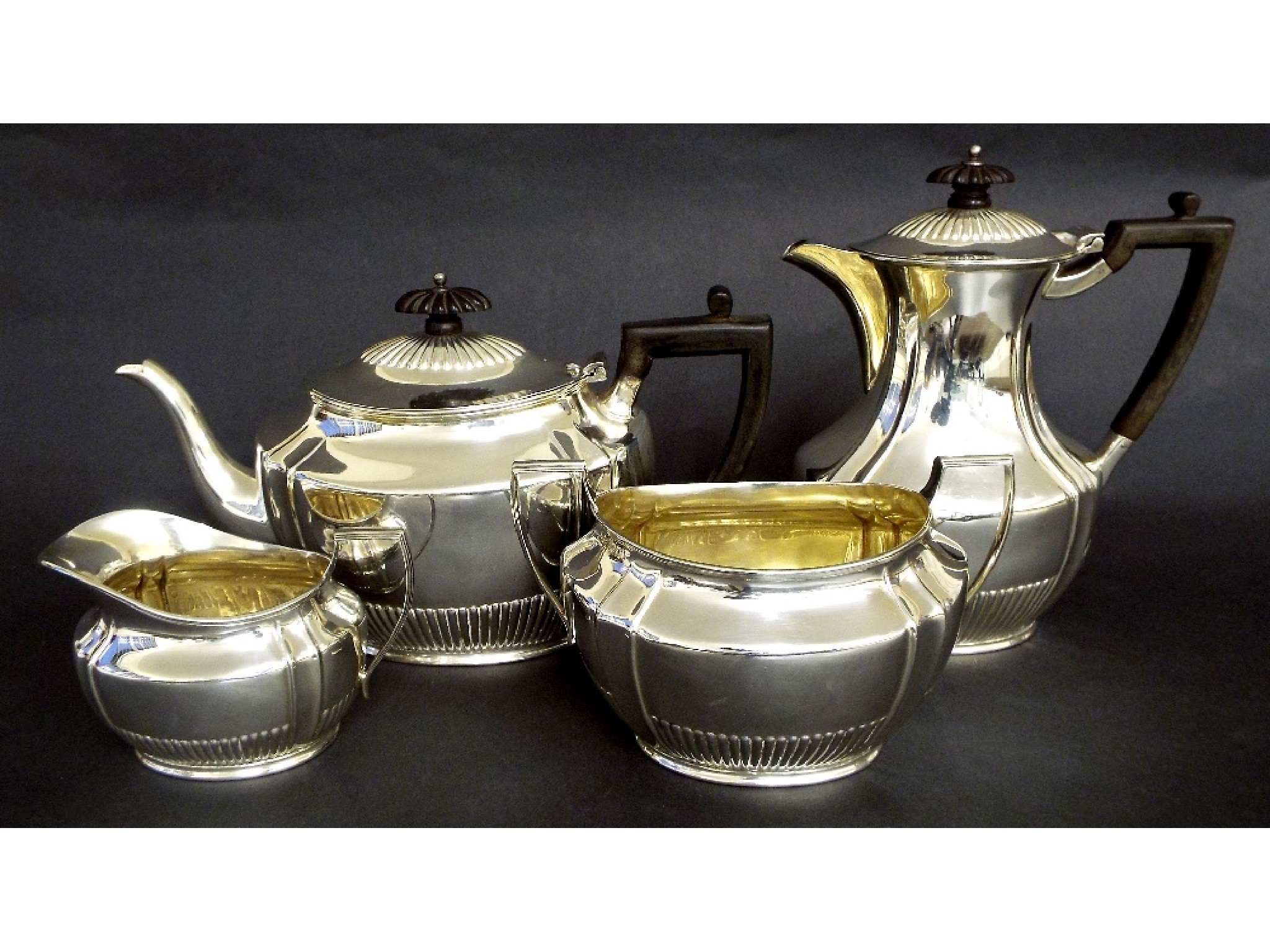 Appraisal: Good Georgian style four piece silver boat shaped tea service