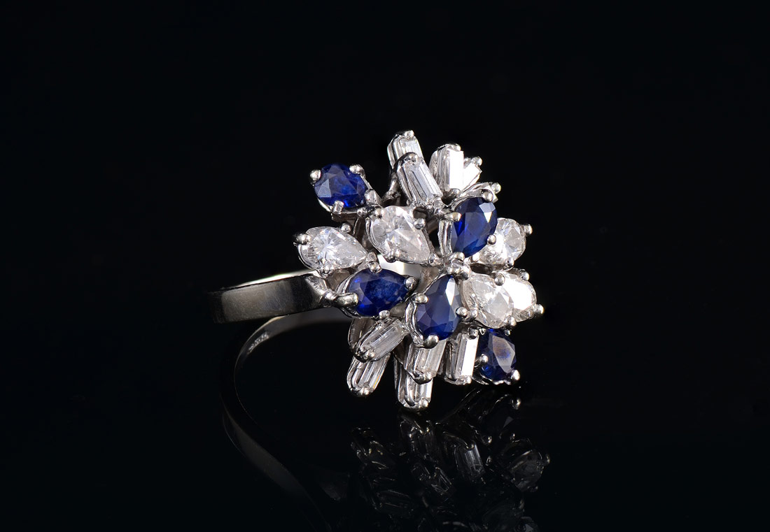 Appraisal: IMPRESSIVE K DIAMOND SAPPHIRE DINNER RING The pear brilliant and