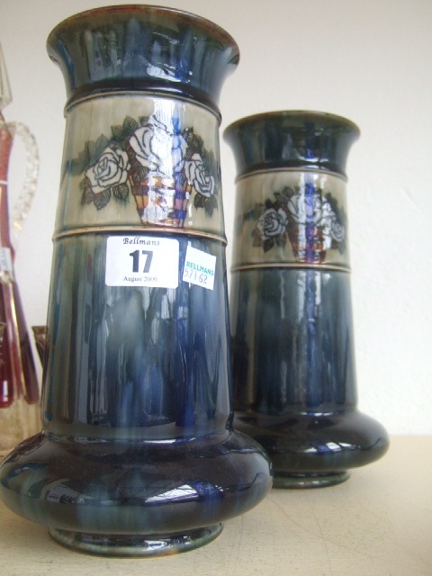 Appraisal: A pair of Royal Doulton saltglaze stoneware vases decorated with