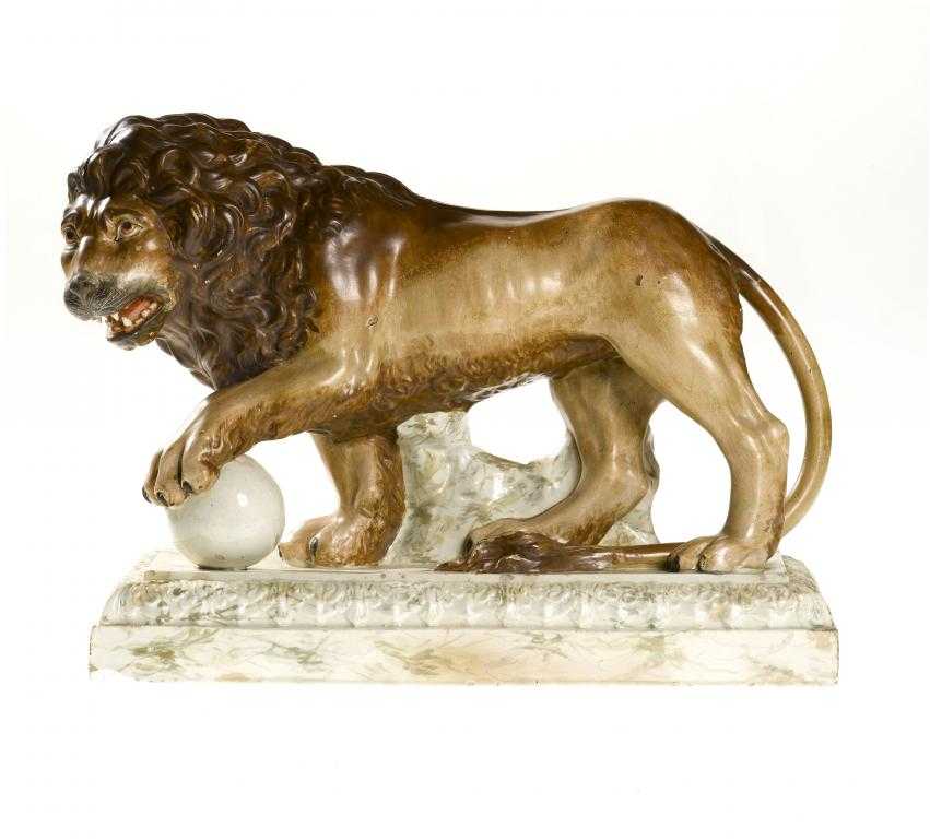 Appraisal: A STAFFORDSHIRE PEARLWARE MODEL OF A MEDICI LION painted in