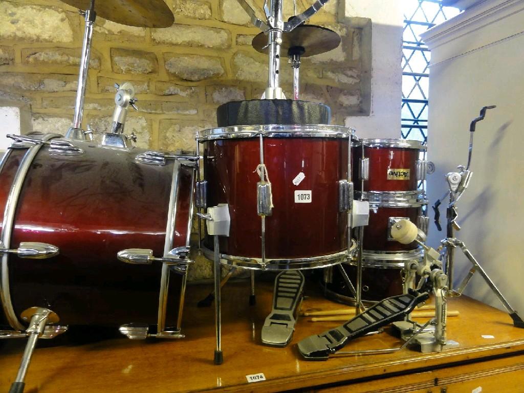 Appraisal: An 'Active' sectional drum kit complete with stool and sticks