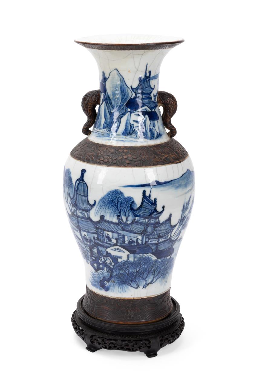 Appraisal: CHINESE BLUE WHITE CRACKLE VASE ON WOODEN STAND Chinese blue