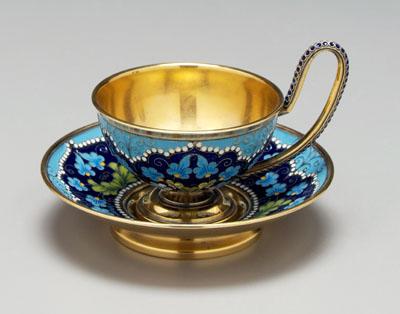 Appraisal: Russian silver teacup saucer gilt interiors blue and green floral