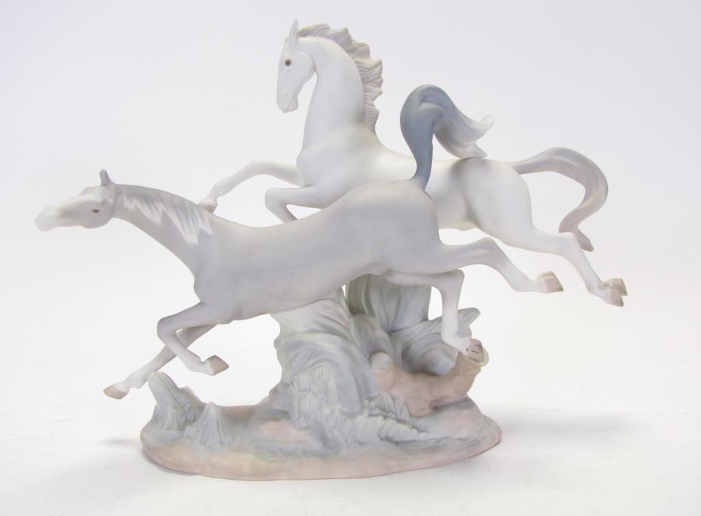 Appraisal: Lladro Galloping Horses Porcelain Figure issued sculptor Vicente Mart nez