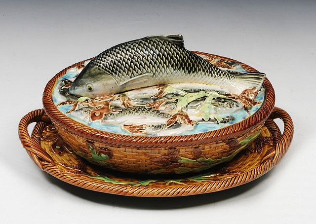 Appraisal: A VICTORIAN MAJOLICA OVAL SARDINE DISH cover and stand the