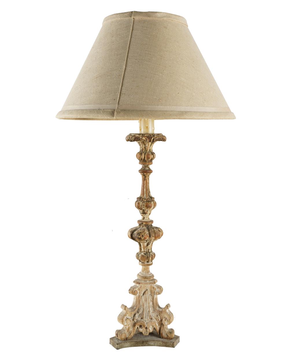 Appraisal: CONTINENTAL CARVED WOOD CANDLESTICKmounted as a table lamp with linen