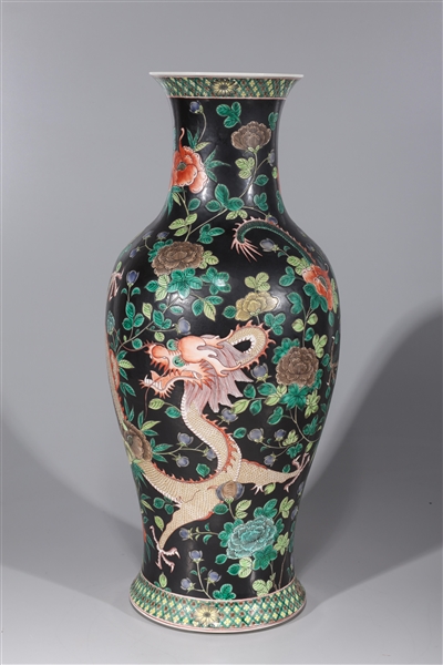 Appraisal: Tall Chinese famille noir enameled porcelain vase with numerous dragon