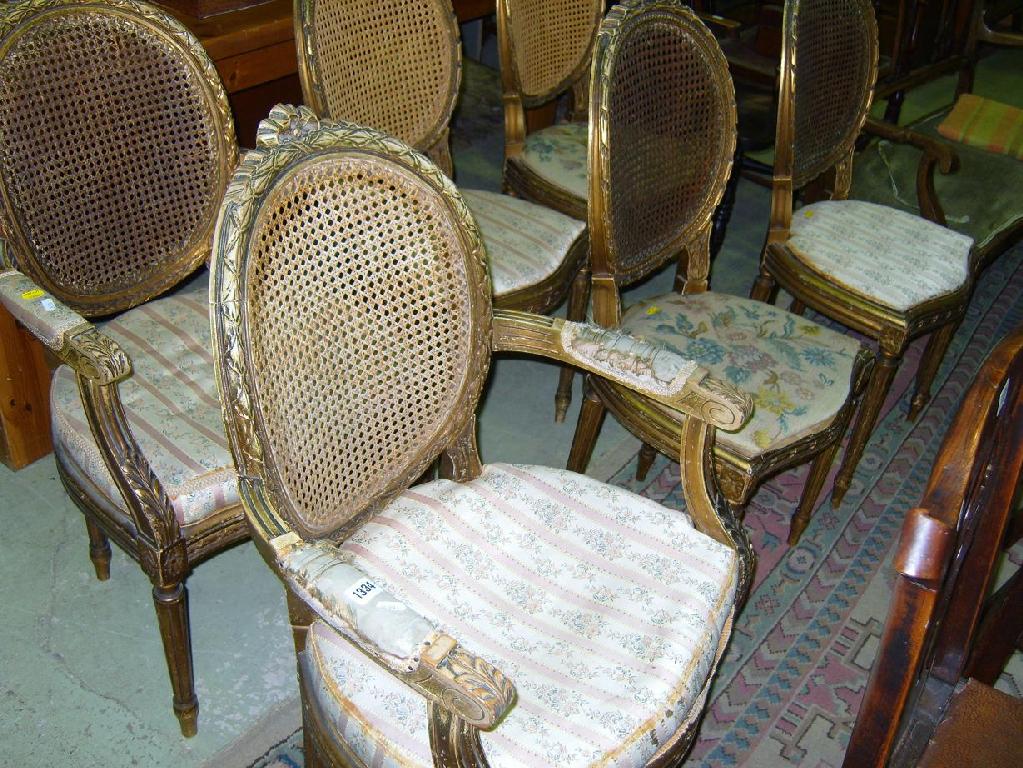 Appraisal: A set of six dining chairs with spoon backs carved