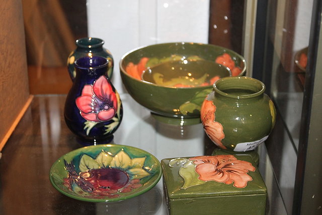 Appraisal: A COLLECTION OF SEVEN MOORCROFT PIECES circa to include fressia