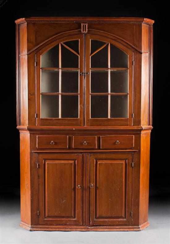 Appraisal: Federal pine glazed paneled door corner cupboard Pennsylvania fourth quarter-