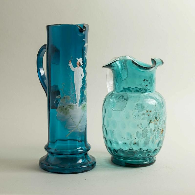 Appraisal: Two Enamel Art Glass Pitchers Two blue enamel art glass