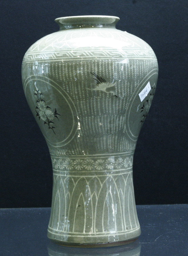 Appraisal: A Korean celadon glazed vase with flowers and crane decoration