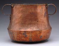 Appraisal: DOVETAILED TWO HANDLED COPPER POT Hand hammered with dovetailed joint